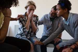 Support group session during addiction recovery counseling.